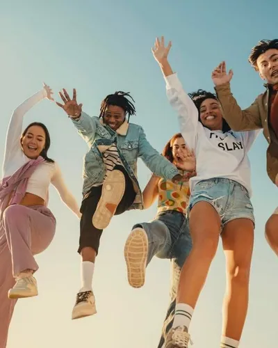 Friends jumping together